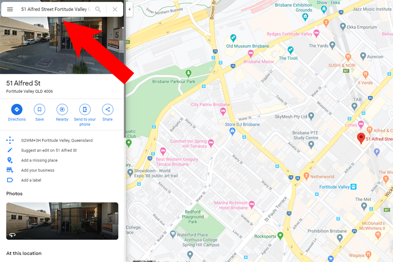 A Google Maps screenshot displays the location “51 Alfred Street, Fortitude Valley, QLD 4006.” The left sidebar shows a photo of the building and location details. A red arrow points to the building photo, indicating the specific address on the map.